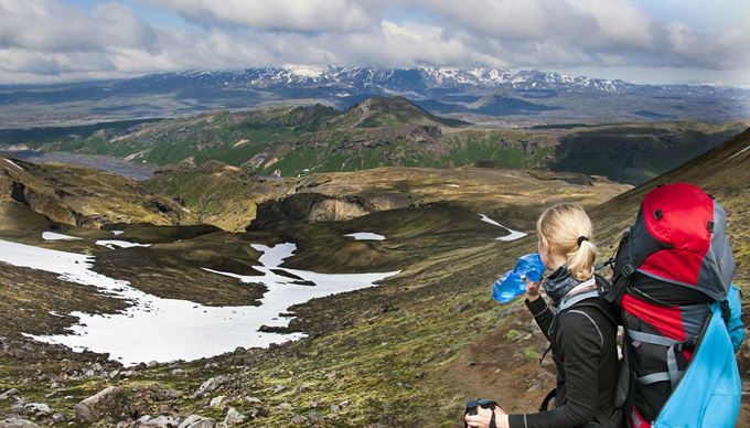woman enjoying fimmvorduhals trail view
