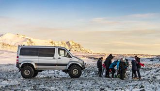 super jeep driving on a glacier in iceland
