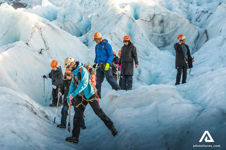 small group walking to ice cave
