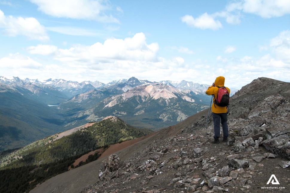 hiker looking over a mountain range