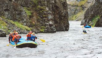 Two Boats And Kayak Rafting Glacial River