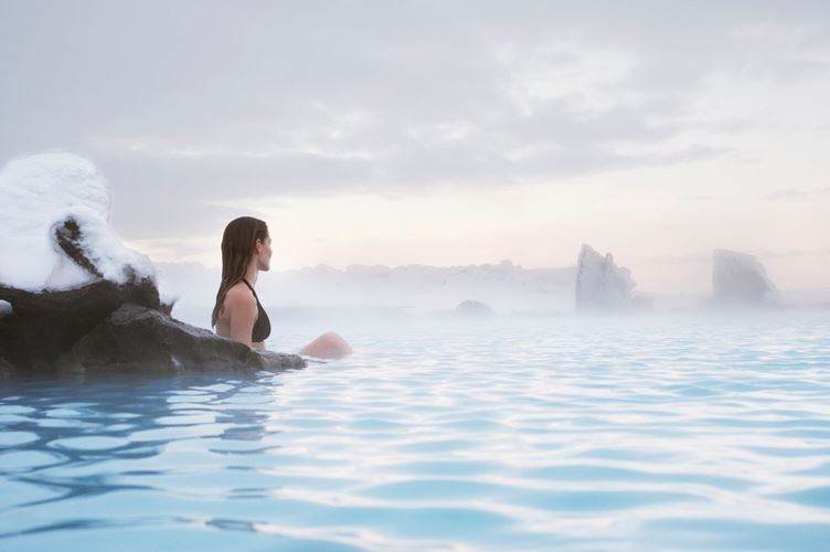 Woman bathing in Myvatn natural baths
