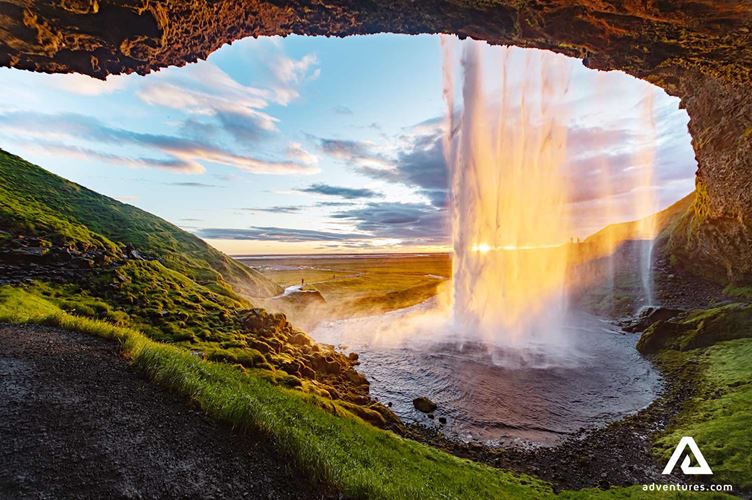sunset at seljalandsfoss falls in south iceland
