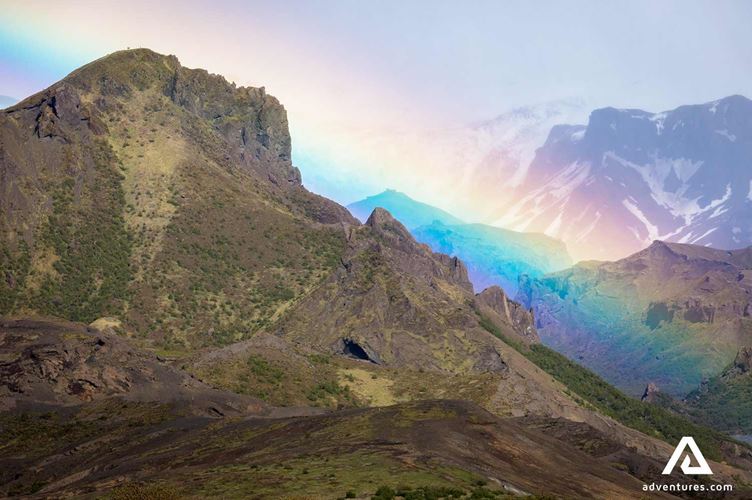 rainbow above a mountain in thorsmork valley in summer