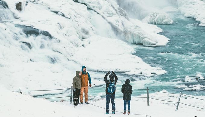 Taking picture near Gullfoss waterfall
