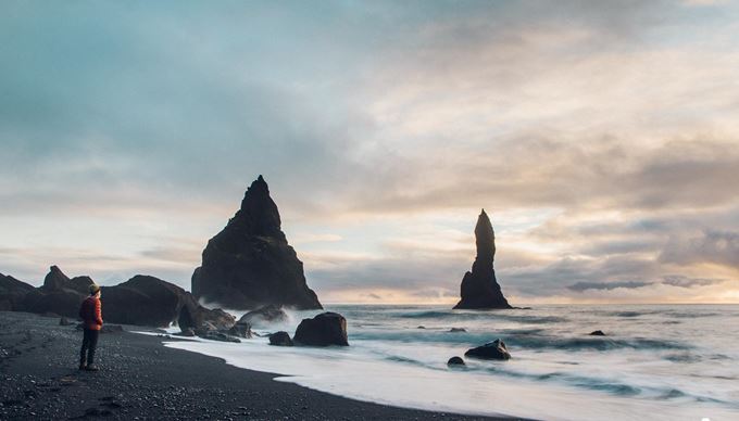 Reynisfjara Black Sand Beach And Rocks In Iceland