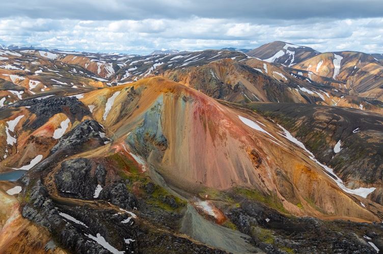 Multi colored blue, red, yellow and green rhyolite mountains 