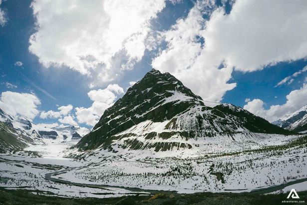 steep snowy mountain peak in canada