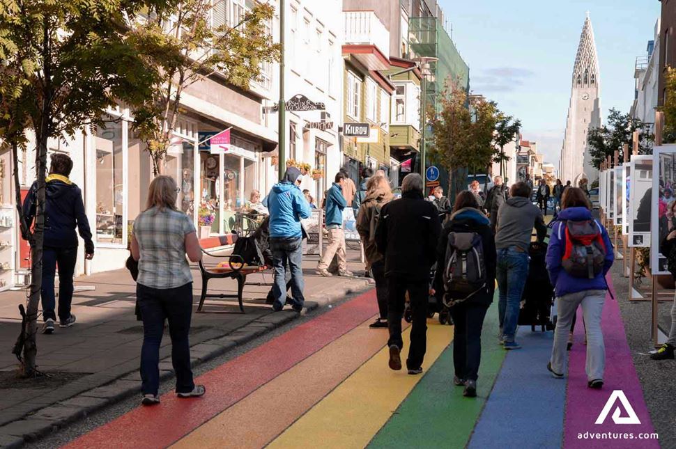 people walking down laugavegur street in reykjavik