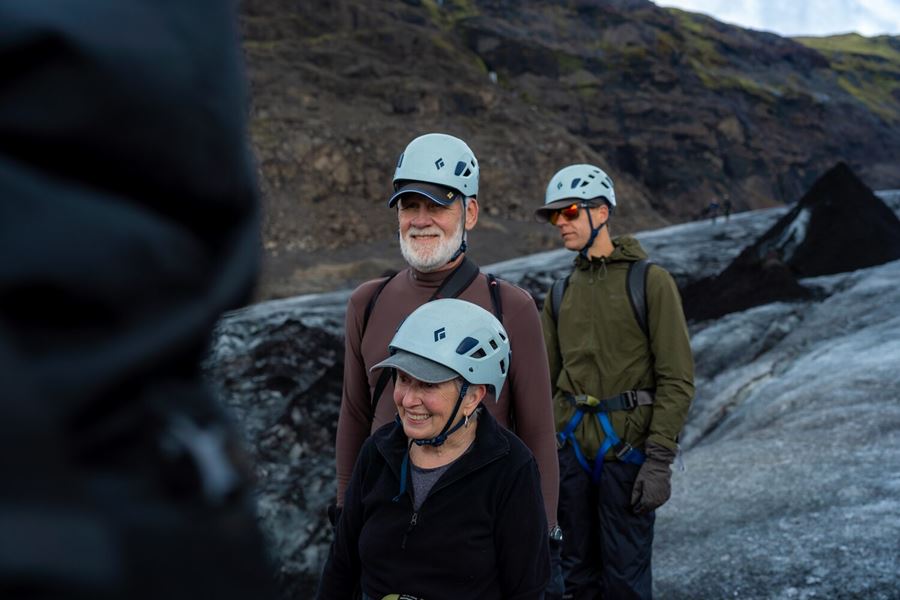 Happy people on glacier in Iceland