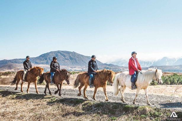 People on a horse riding tour in Iceland