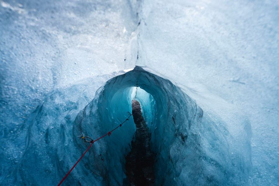 Long ice tunnel on glacier in Iceland