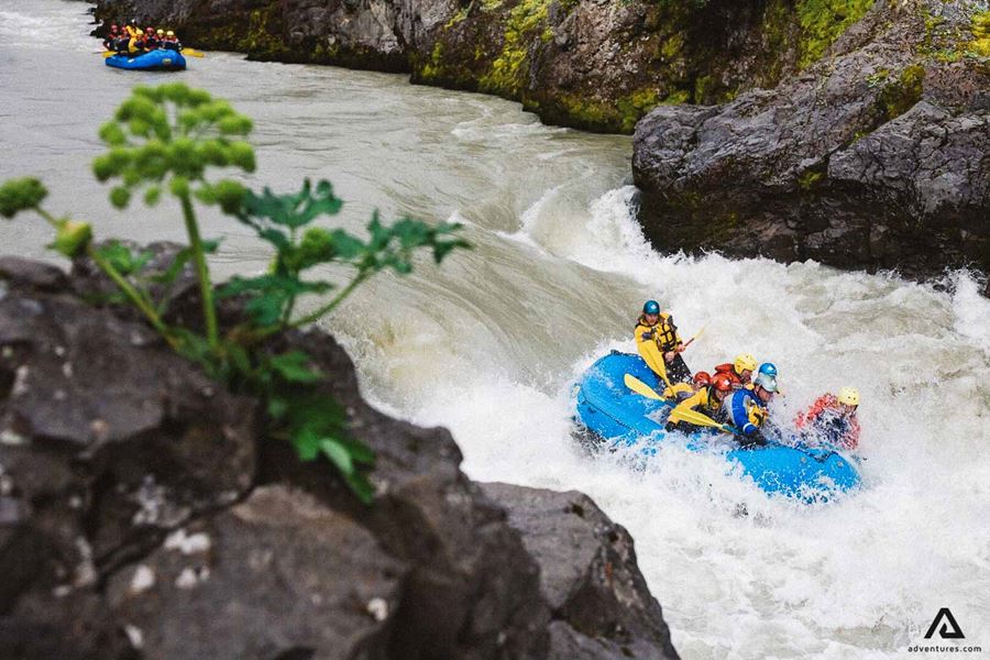 People Rafting Fast Stream Glacier River