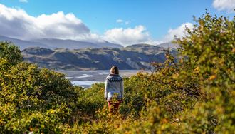 woman standing near basar camping site in thorsmork