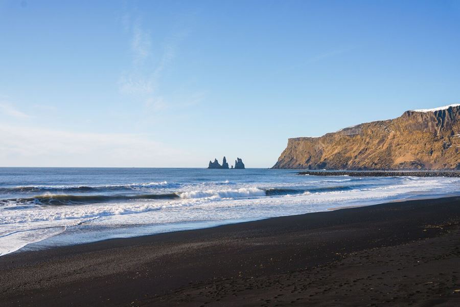 Rock Formations In Water At A Beach In Iceland