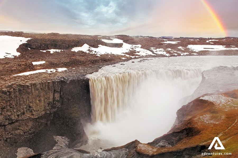 winter rainbow above dettifoss