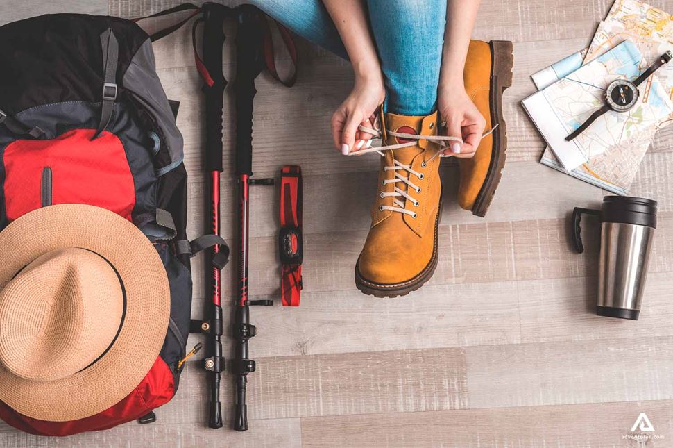 Woman Lacing up shoes
