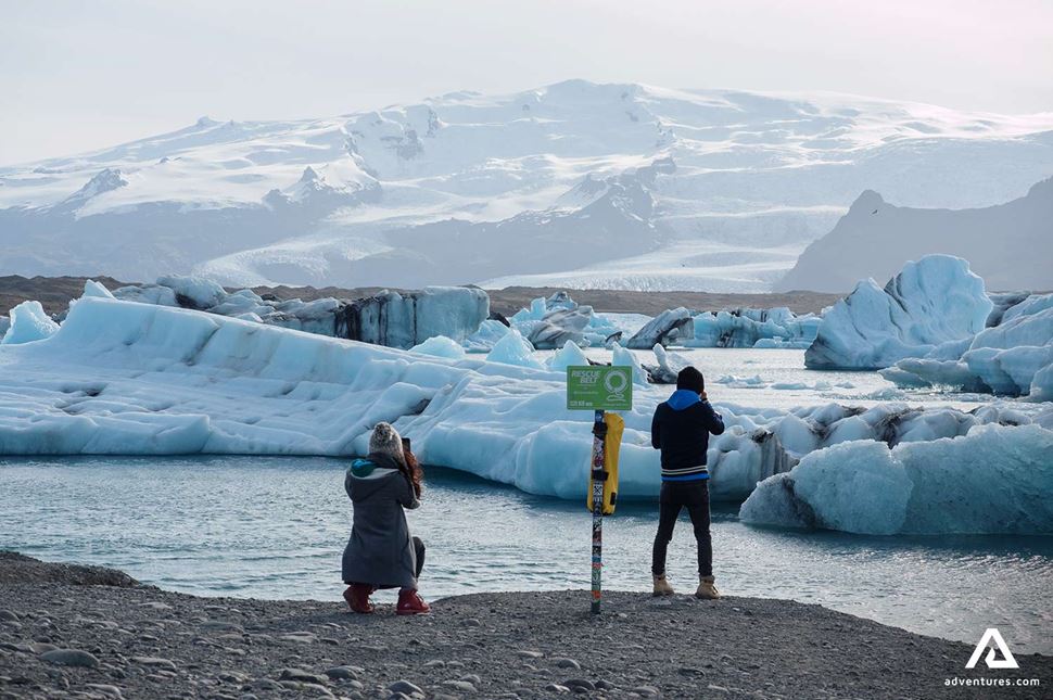 People Taking Pictures of Icebergs in Glacier Lagoon