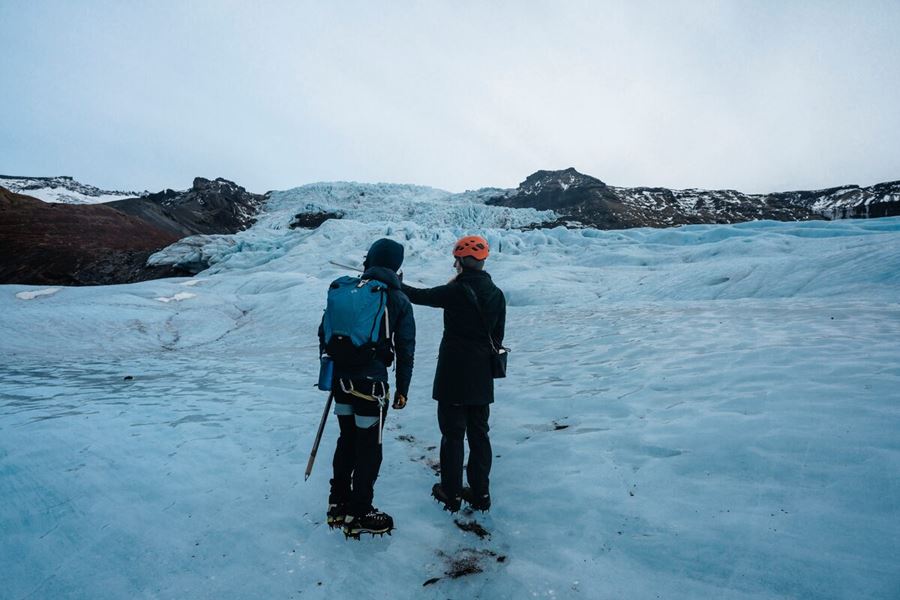 Couple of people standing on Vatnajokull glacier