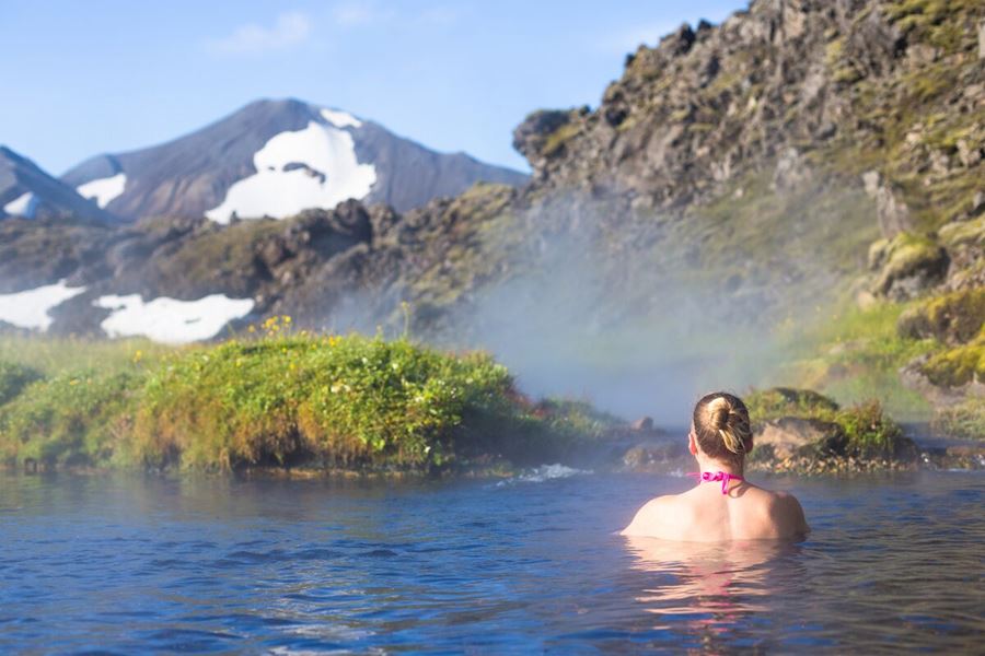 Female Tourist Relaxing Hot Springs